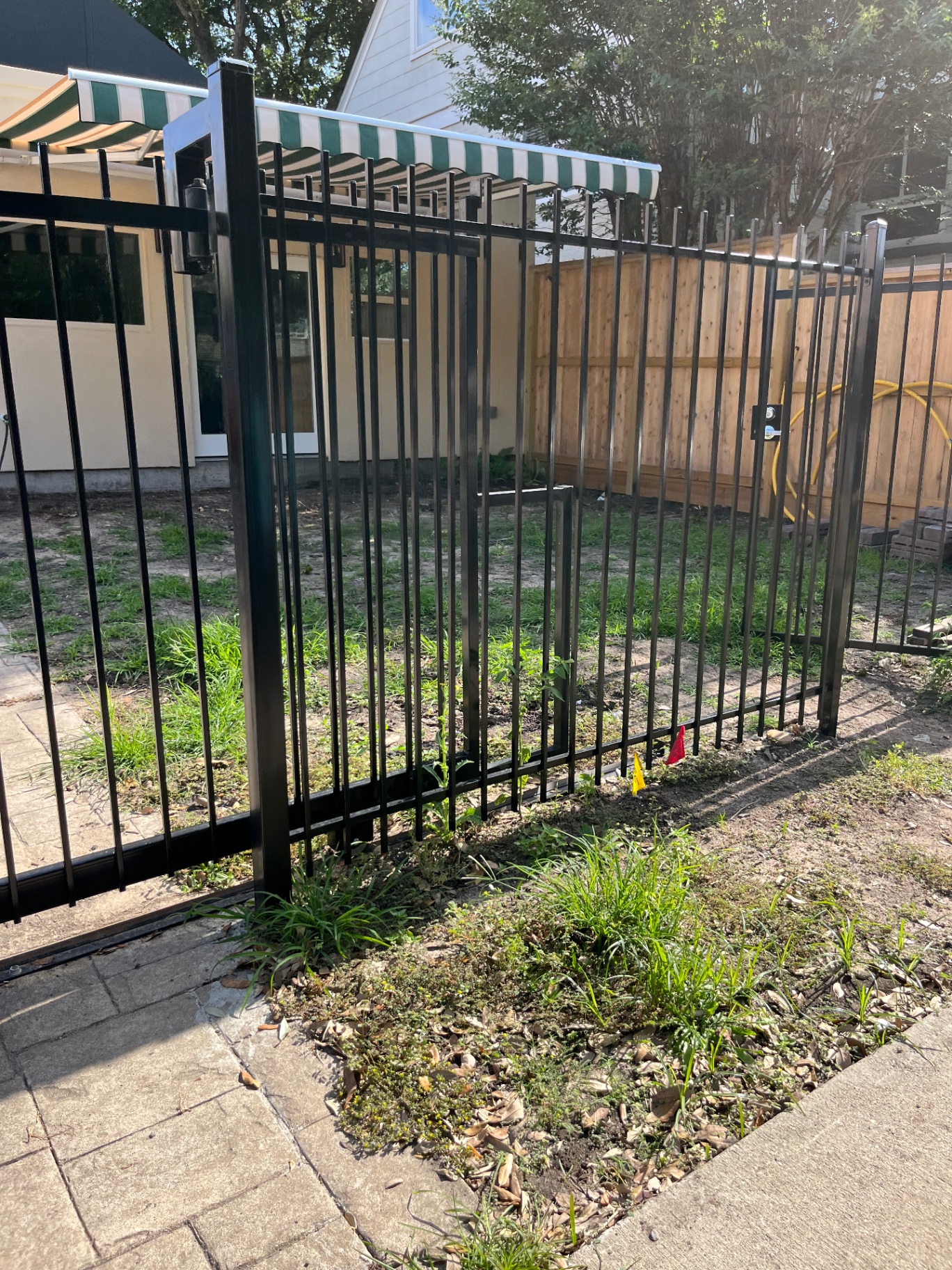 Before — iron fence installation
